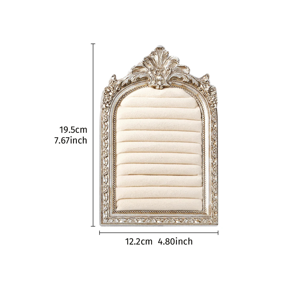 A rectangular jewelry display stand with an arched, ornate frame and a beige fabric insert.
