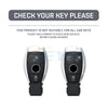 A pair of slim car key covers, black and silver, shown for checking before placing an order.