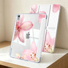 A clear tablet case featuring a pink lily flower design and a built-in pen holder.