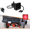 A black universal 12V LED trailer tail light with brake and running functions mounted on a vehicle.