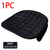 A black quilted car seat cover with a square-front row design.