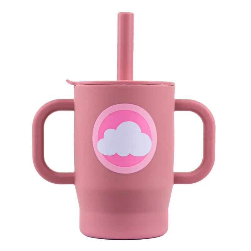 A pink silicone training cup with a straw and handles for baby.