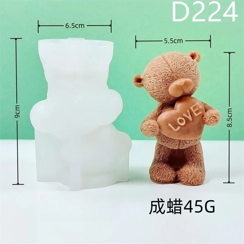 A small brown silicone bear mold is shown next to a clear white mold, used for crafting.