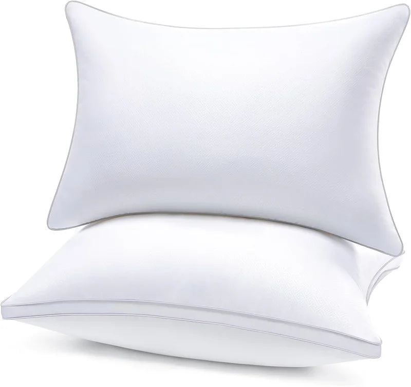 A white luxury goose down and feather pillow with a 100% cotton cover.