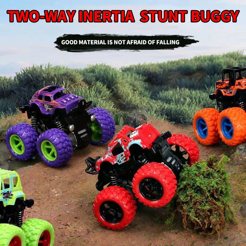 A collection of two-way inertia stunt buggies in various colors and sizes on a dirt terrain.