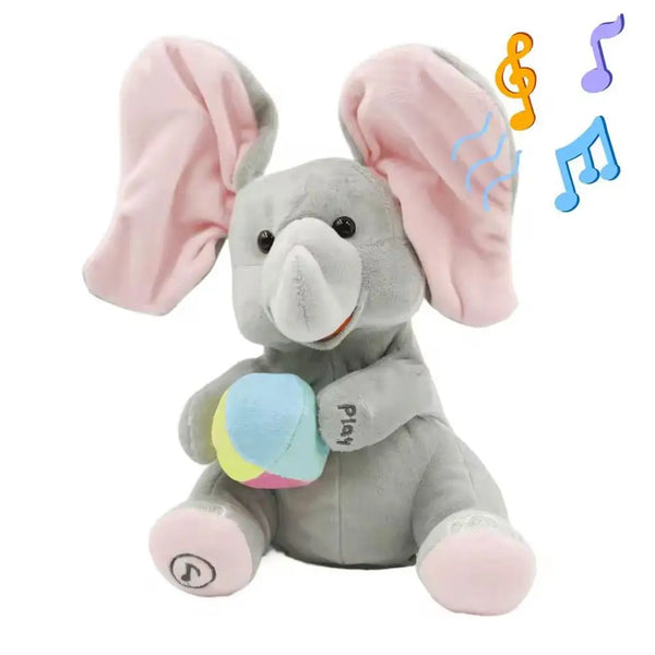 Peluche d'éléphant gris avec des oreilles roses et un nez bleu clair, ornée de notes de musique.