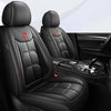 Black universal PU leather car seat covers installed in a vehicle interior.