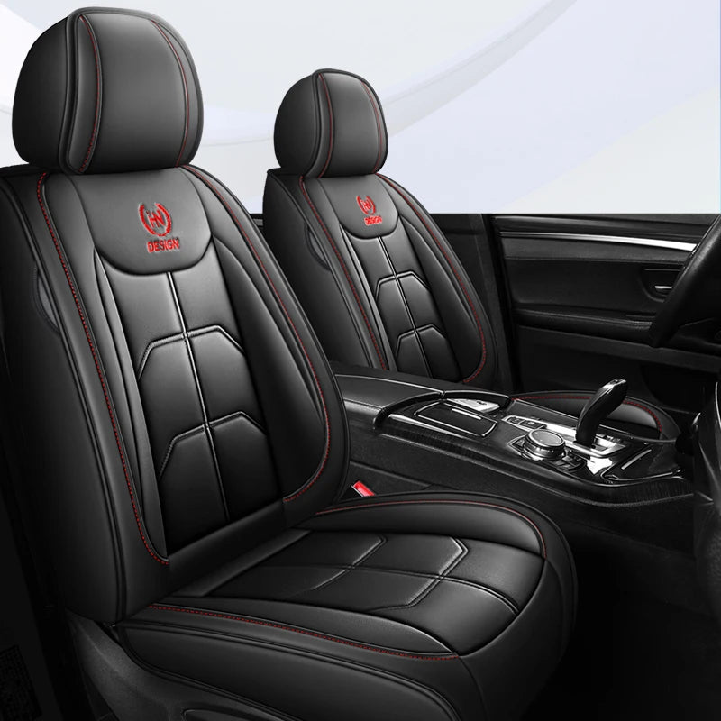 Black universal PU leather car seat covers installed in a vehicle interior.