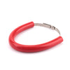 A red universal dirt bike exhaust guard, a flexible metal tube designed to protect the exhaust system.