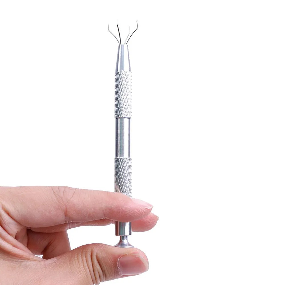 A hand holds a silver 4-prong precision pick-up claw for jewelry making tool.
