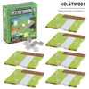 A set of six magnetic base plates for building blocks, featuring green and white sections.