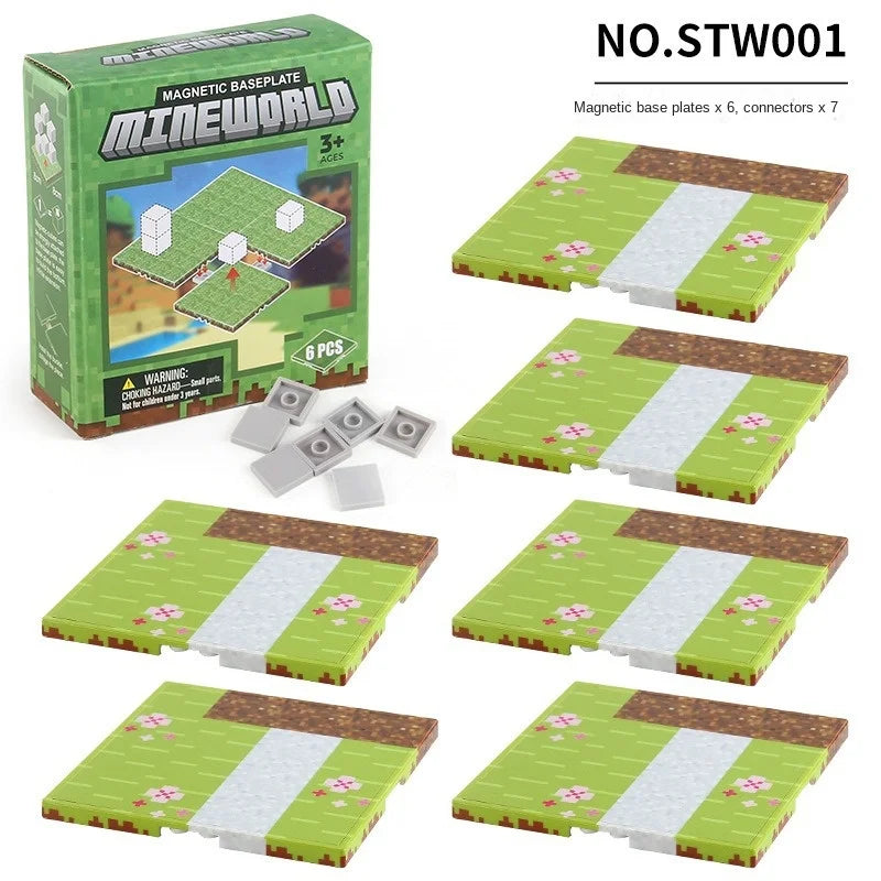 A set of six magnetic base plates for building blocks, featuring green and white sections.