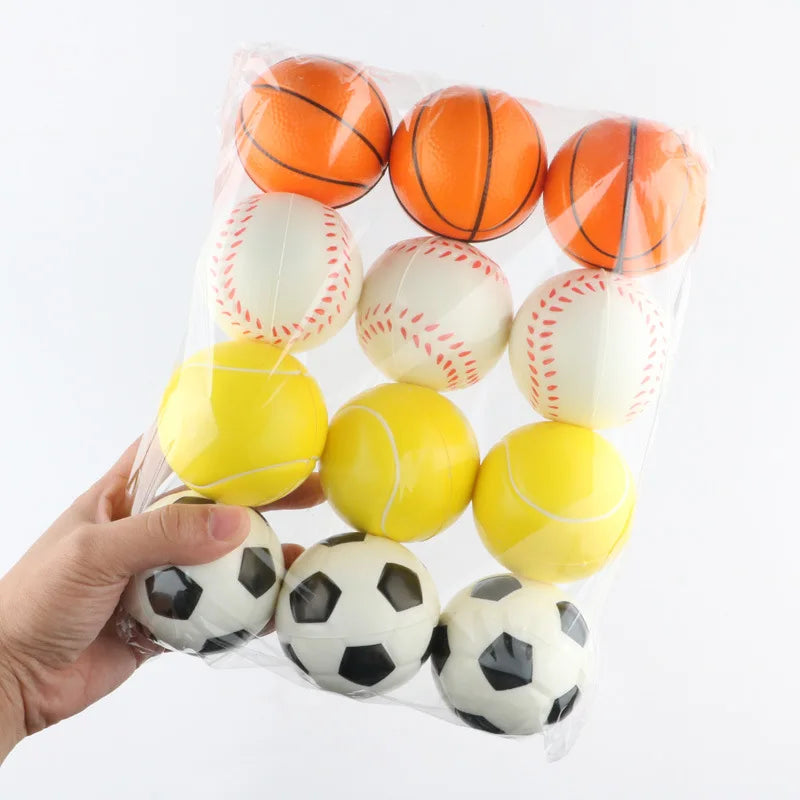 A clear plastic bag contains a set of soft foam sports stress balls in orange, white, and yellow colors.