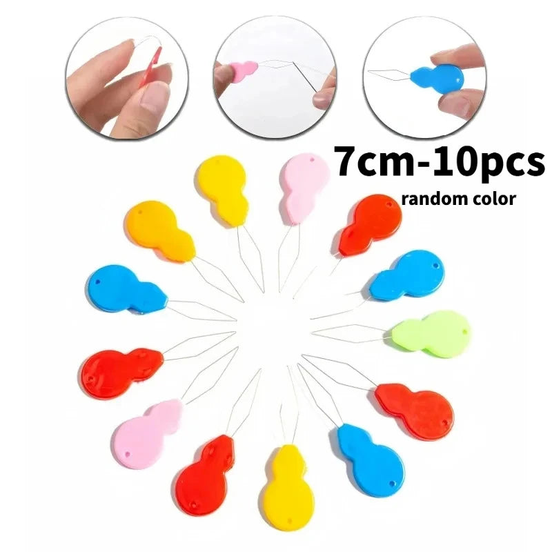 A collection of 10 plastic needle threaders in various random colors shown with close-up examples.