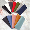 Colección de fundas protectoras para gafas de cuero PU en varios colores: negro, rojo, verde, beige y azul.