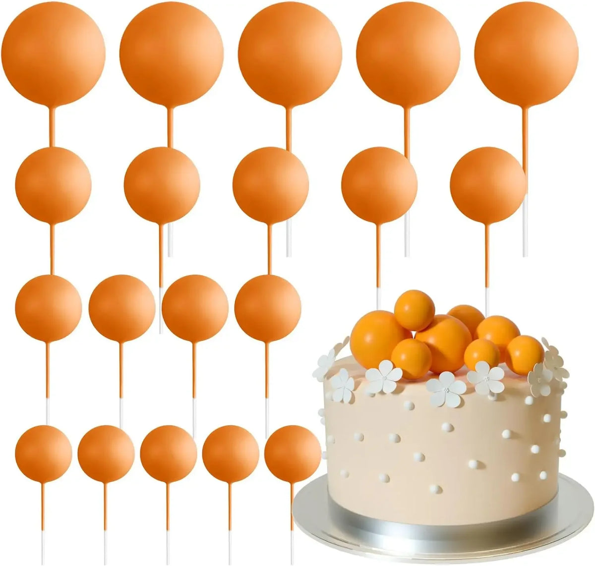 Mehrstöckiger Kuchen mit orange-weißen Kugeln auf Stäbchen.