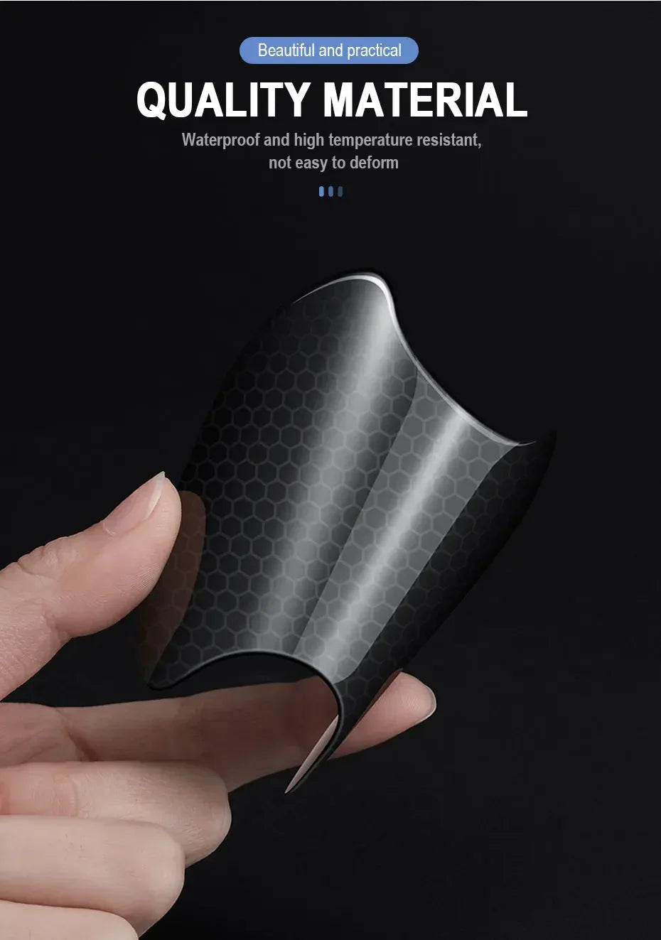 A hand holds a black carbon fiber door handle protector sticker, showing its texture and shape.