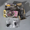 A set of premium metal spinning tops and related accessories packaged in cardboard boxes and plastic bags.