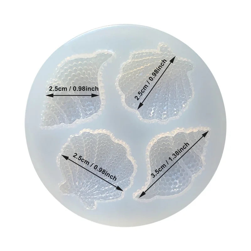 A silicone mold set with four individual cavities for decorating cakes, showing various sizes like 2.5cm and 3.5cm.