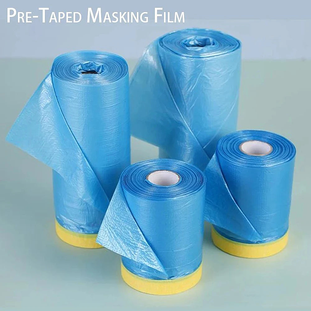 Rolls of blue pre-taped masking film used for painting projects