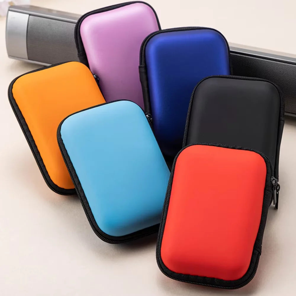 A collection of colorful hard EVA protective cases for a SanDisk Extreme Portable SSD, displayed in various shades.