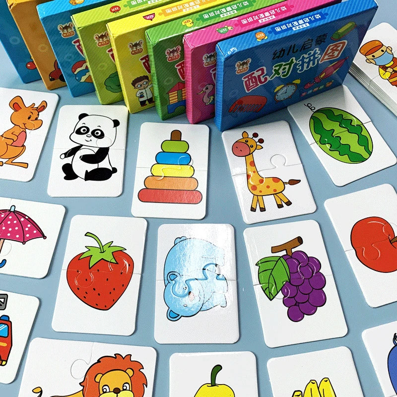 A collection of colorful puzzle cards featuring various animals and fruits for a toddler matching game.