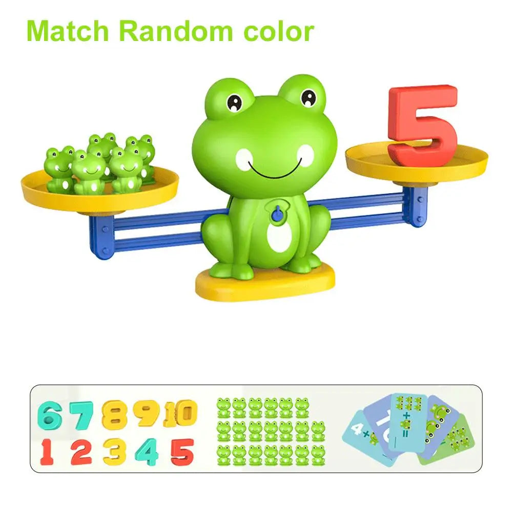 A green frog toy is balanced on a yellow platform, part of a match random color math learning set.