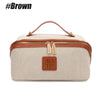 Beige Reise-Make-up-Organizer-Tasche mit braunem Lederbesatz und Tragegriff