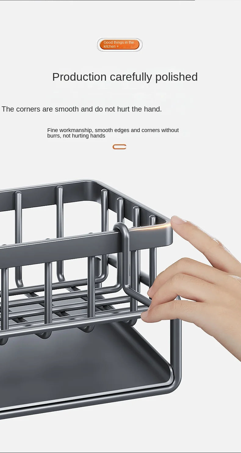 A hand is shown placing a stainless steel sink organizer basket into a drainage tray.