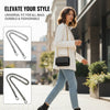A woman models a white blazer and jeans while carrying a black handbag with a gold metal chain strap.