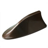 A dark brown shark fin car antenna with FM/AM signal enhancement.