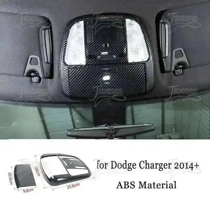 Carbon fiber interior trim kit for Dodge Charger 2014+ featuring a headlight cover and vent panel.