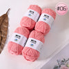 Pink Milk Cotton yarn skeins in various shades and a pink label marked #06