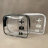 Clear quart-size toiletry bag with icons for travel items like a plane, suitcase, and toiletries