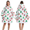 Weißes, patchwork-Oversized-Fleece-Hoodie mit festlichem Weihnachtsdesign aus roten und grünen Rentieren und Schneemännern.