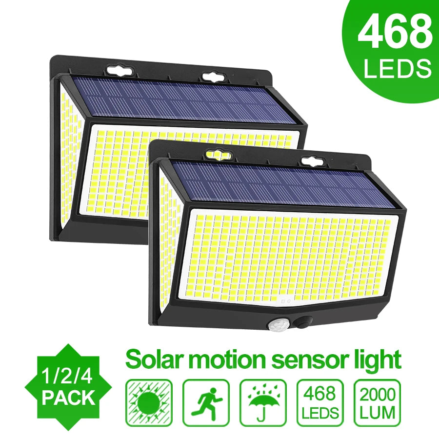 A pair of solar motion sensor lights with yellow LED illumination and a 2000 lumen output.
