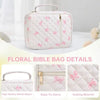 A pink floral quilted Bible bag with a zipper pocket and carry handle shown in a studio setting.