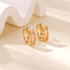 Boucles d'oreilles créoles en zircon cubique ton or