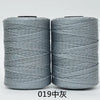 Two spools of gray 3-ply polyester knitting yarn for crochet and hand crafts