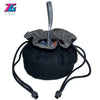 Black velvet dice storage pouch with a drawstring and black cord