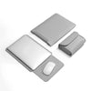 A gray water-resistant PU leather laptop sleeve shown with the laptop and an extra protective cover.
