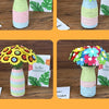 A set of colorful felt flowers and buttons arranged in glass vases for a DIY bouquet making craft kit.