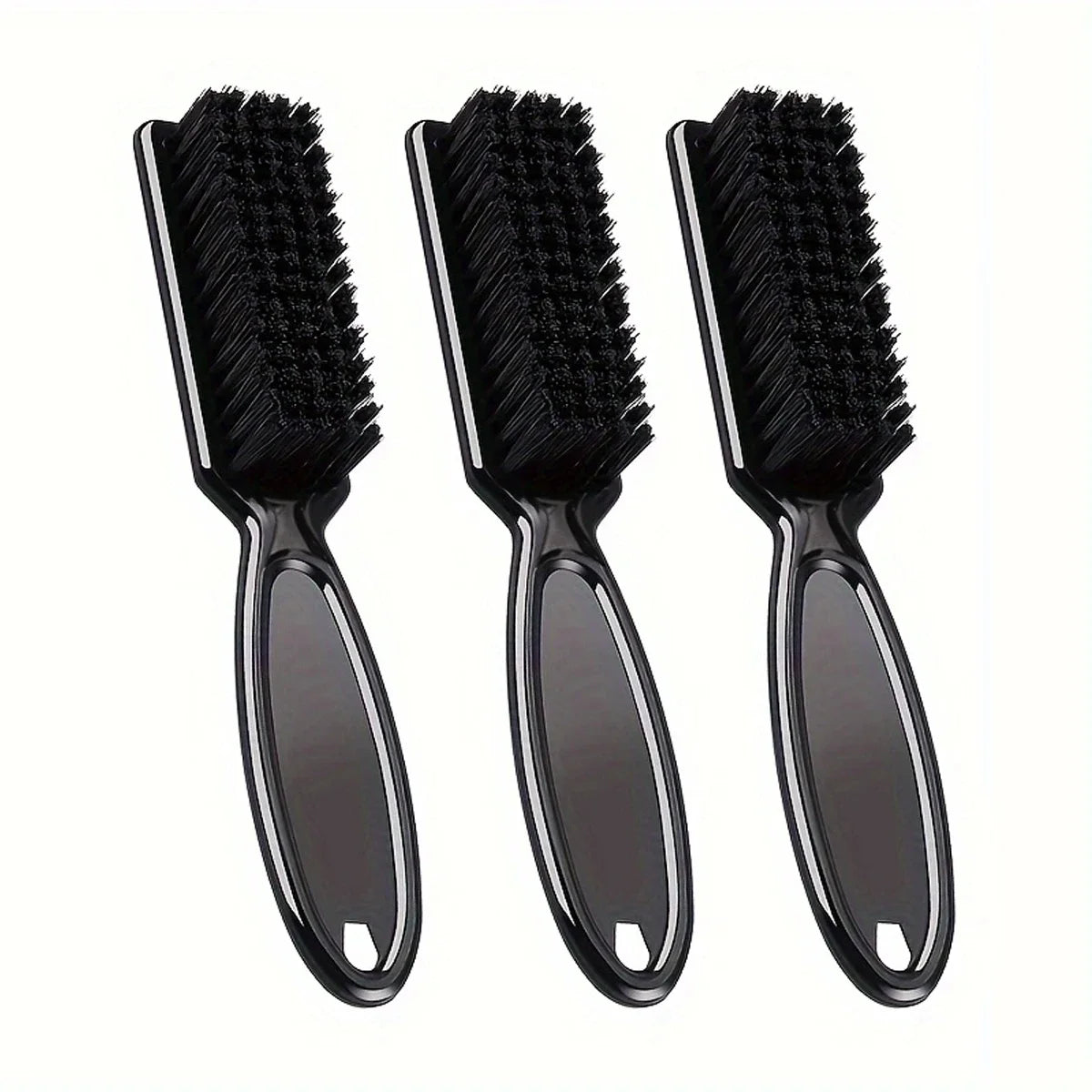 A set of three black grooming brushes for beard and hair care