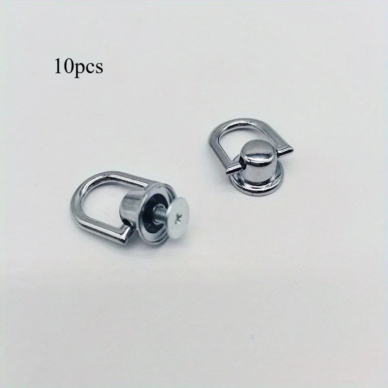 A set of 10 metal bag and phone case hardware kits with screws.