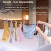 A portable clothesline with clothespins is shown hanging laundry on a bed, demonstrating its use for air-drying clothes.