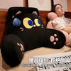 A black cat plush backrest cushion is shown next to a woman, with Chinese text below.