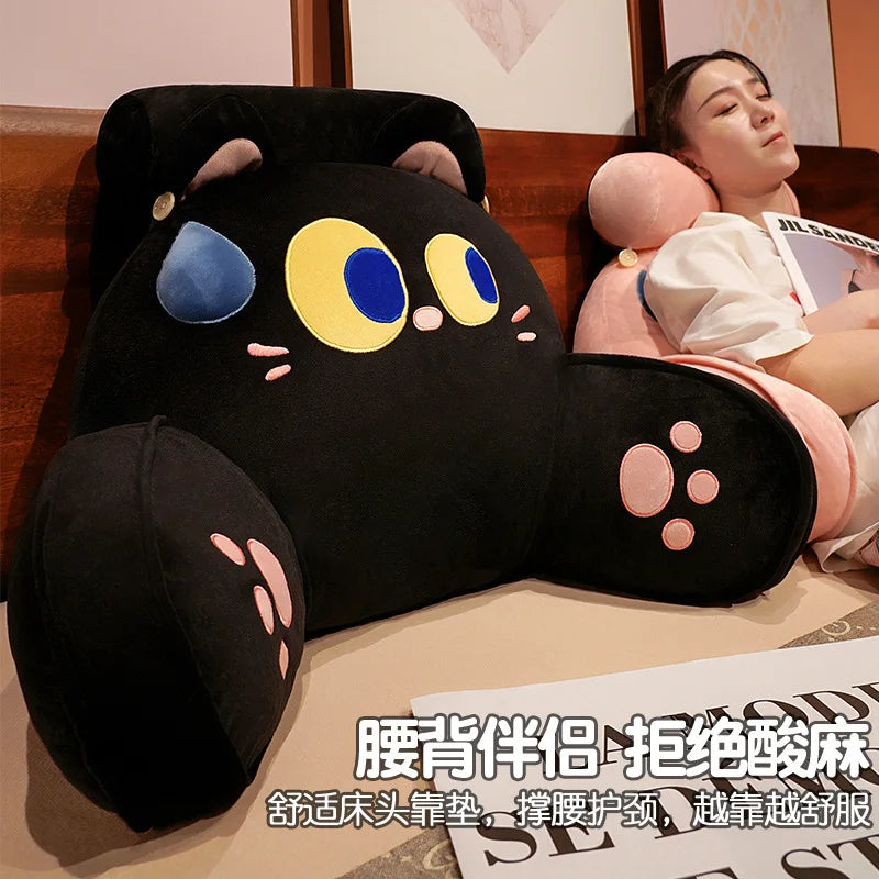 A black cat plush backrest cushion is shown next to a woman, with Chinese text below.