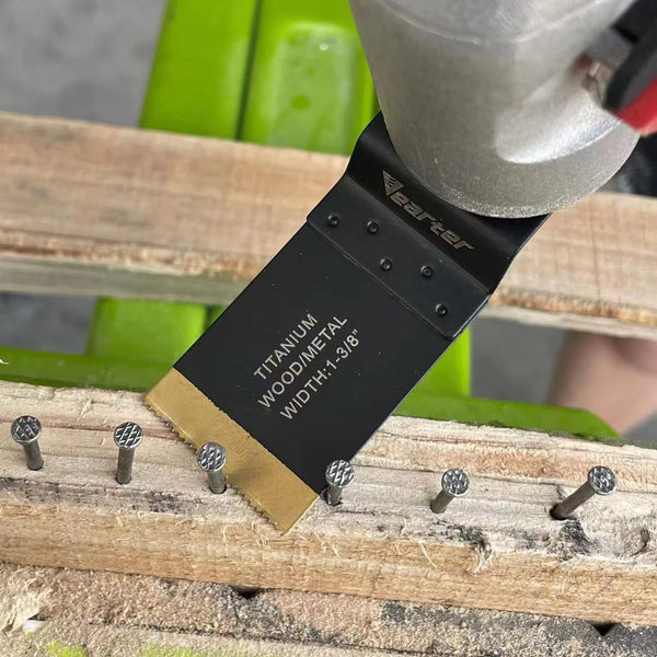 A black titanium coated saw blade is mounted on a wooden stick, showing its side profile.