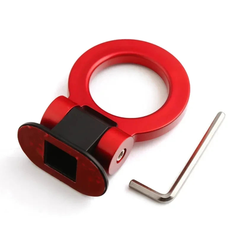 A red sporty trailer hook decorative accent for cars with a metal bar.