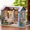 A wooden miniature dollhouse kit featuring a bedroom with LED lights and decorative elements.